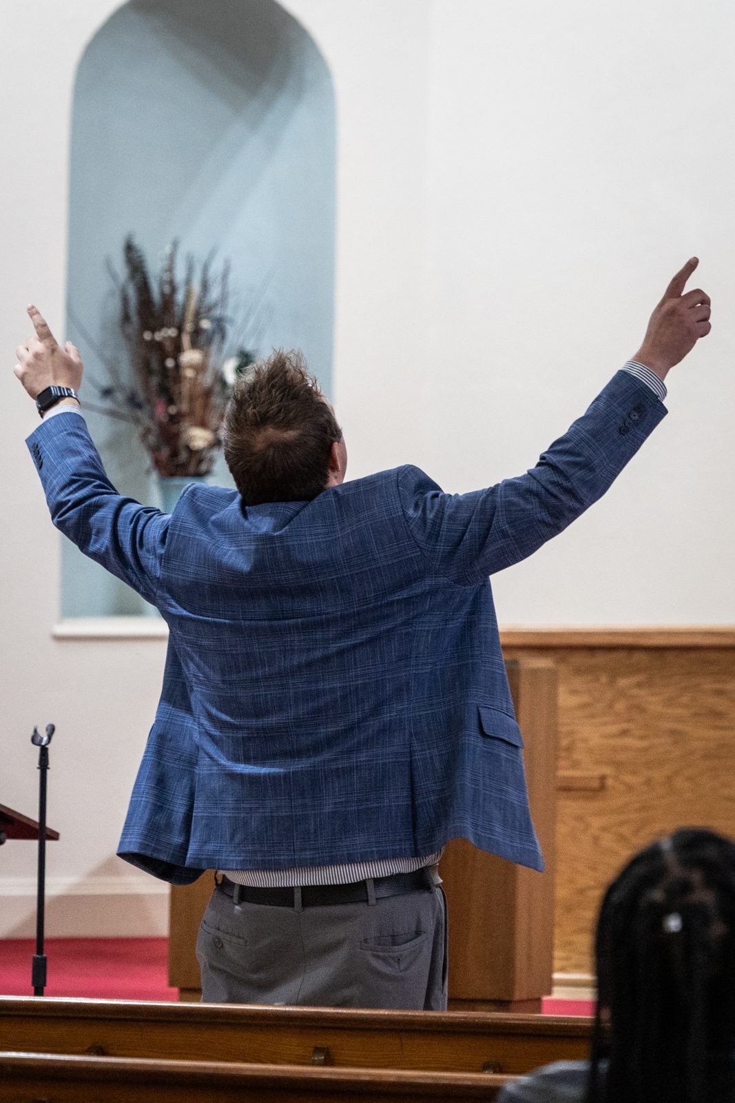Congregation worshipping at Rock Ministries church service in Janesville WI